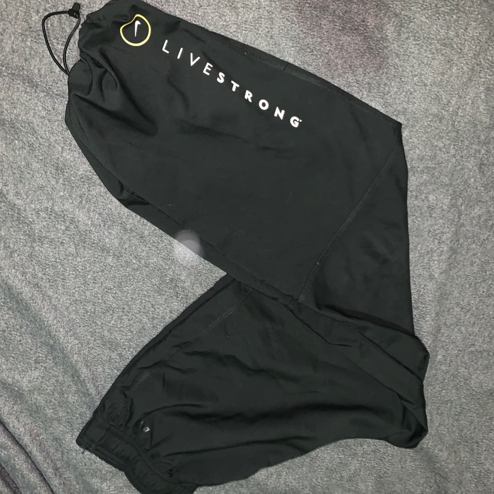 Nike track pants livestrong sz medium